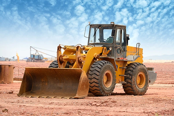 Cargador de ruedas: energía confiable para operaciones con materiales a granel