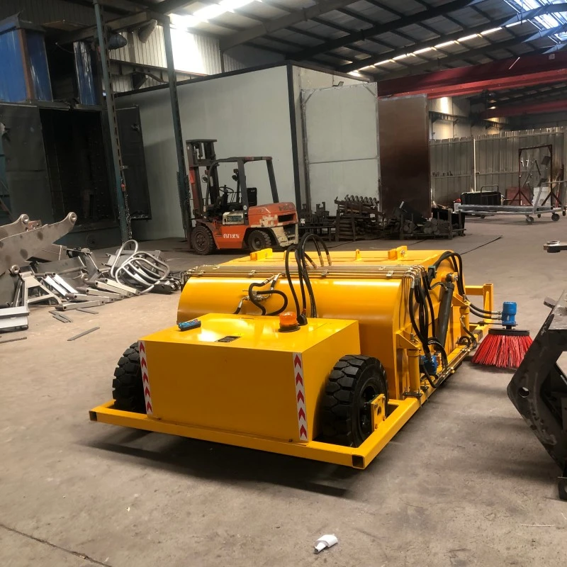 Towed trailer sweeper front view